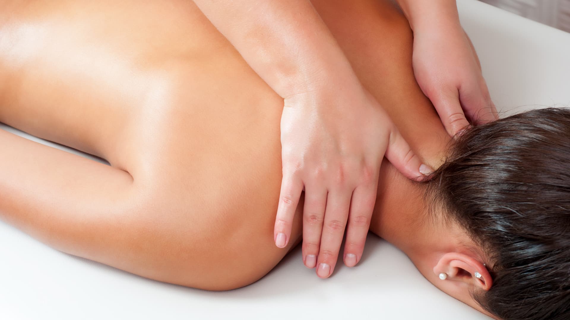 picture of a woman getting a back massage.